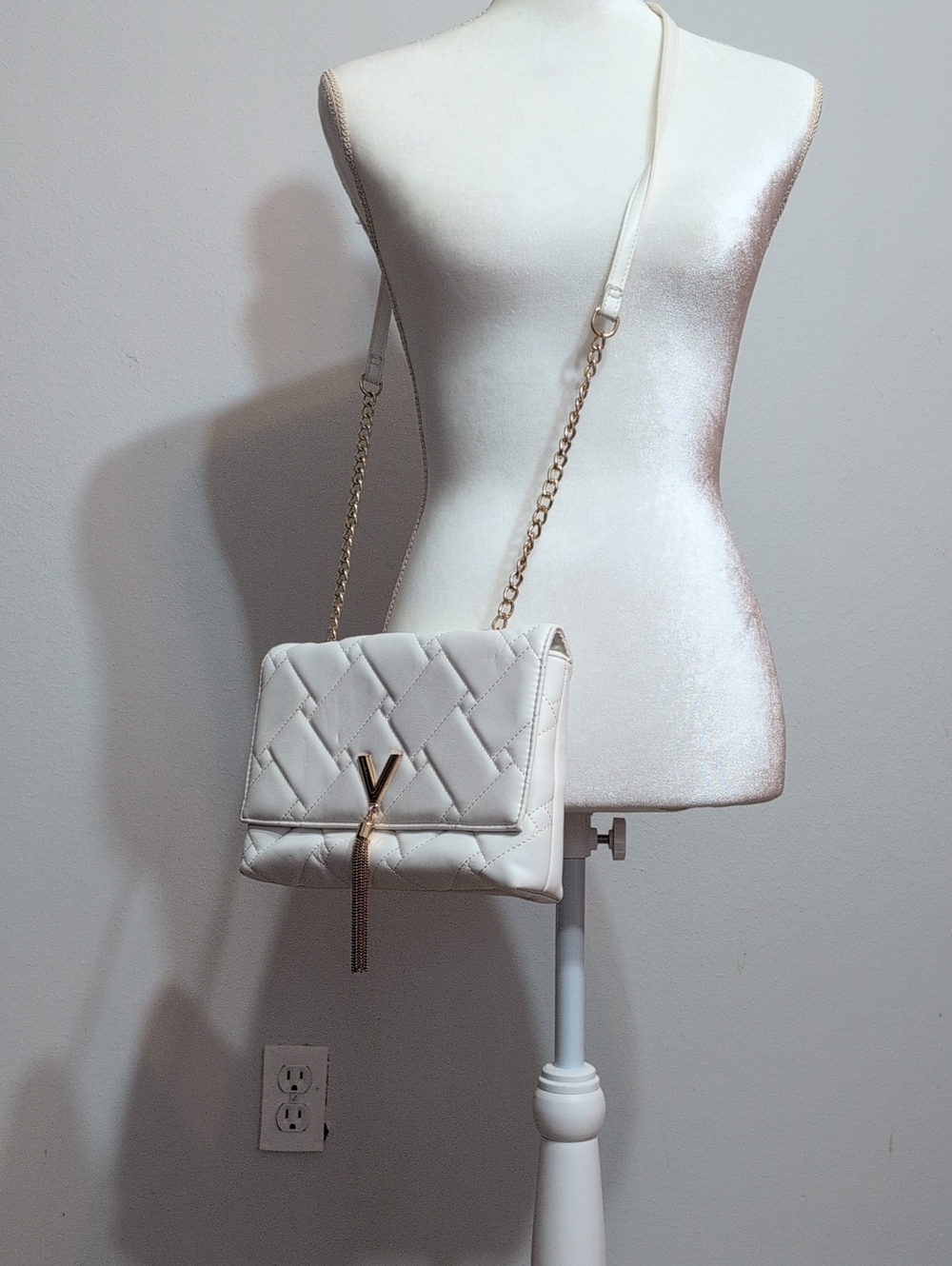 Cream Quilted Shoulder Bag with Gold Tassel Accent